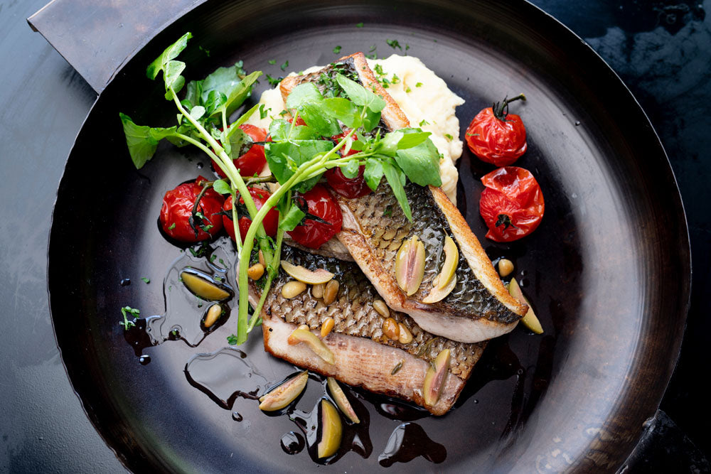 Harderfilet op de huid gebakken met groene olijf en citroendressing